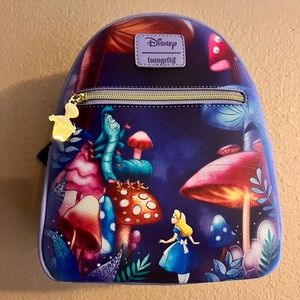 Alice in Wonderland Loungefly bag & Wallet (not matching)